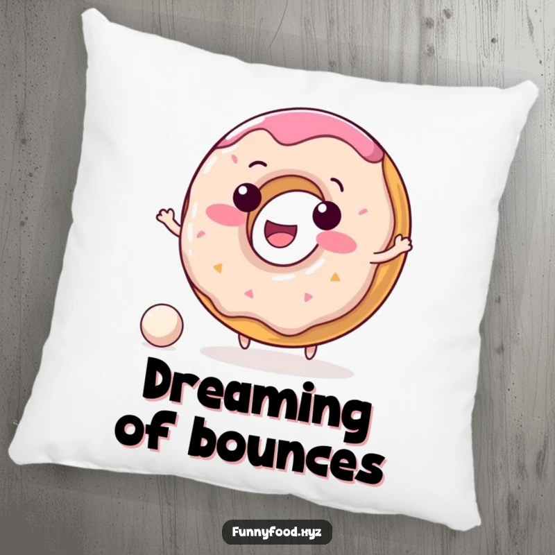 Funny donut pillow with a delighted donut character joyfully bouncing a tiny ball, offering plush comfort and smiles.