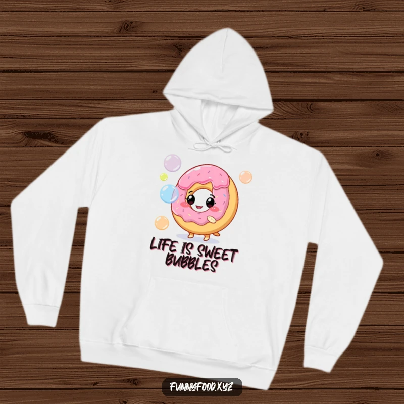 Funny hoodie with a delightful donut character blowing a cascade of colorful, shimmering bubbles.