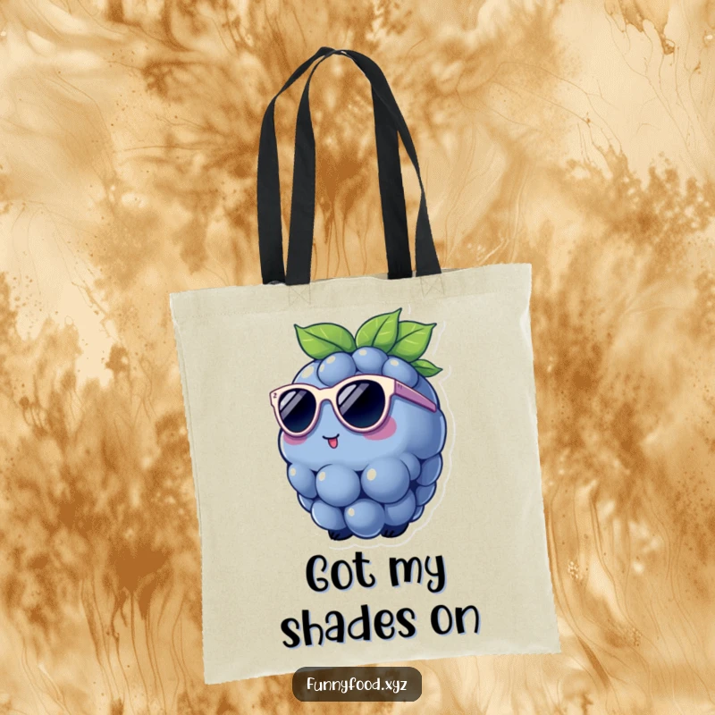 Funny Tote Bag featuring a charming blueberry wearing small sunglasses, ready for a day of stylish and humorous errands.